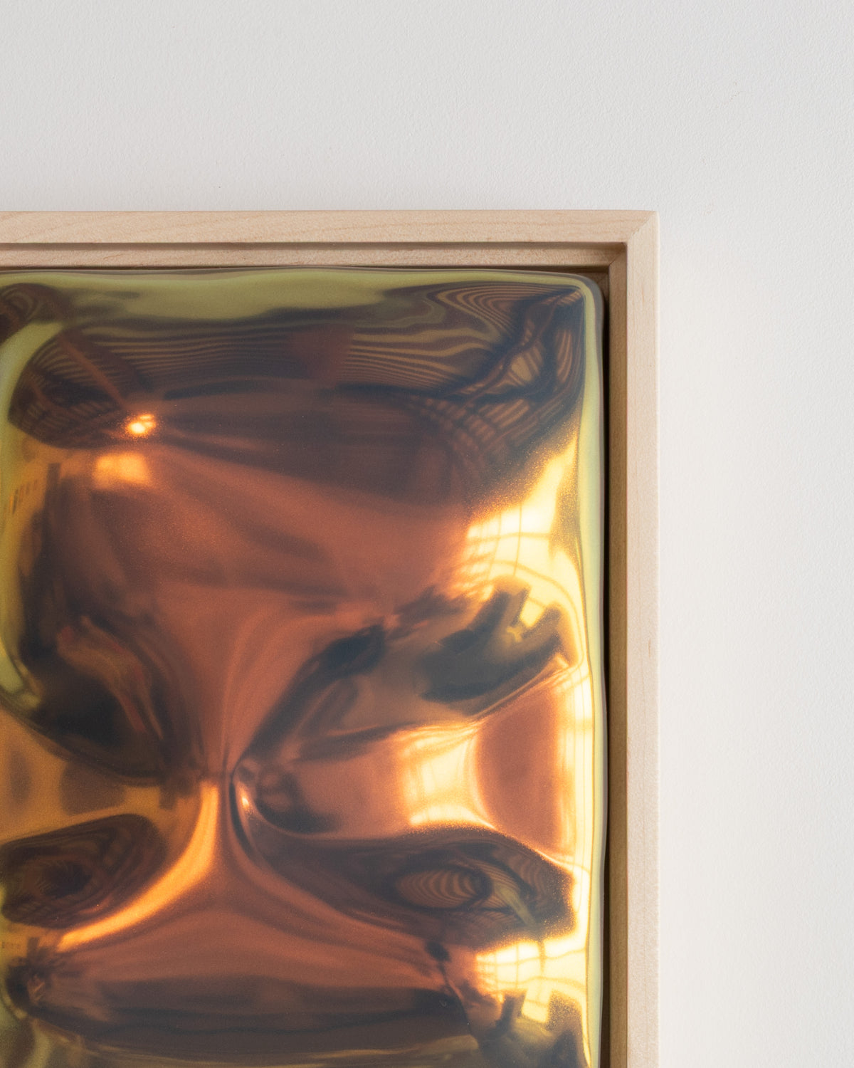 Close-up detail of "Artifact" showing raised abstract forms and reflective iridescent glaze
