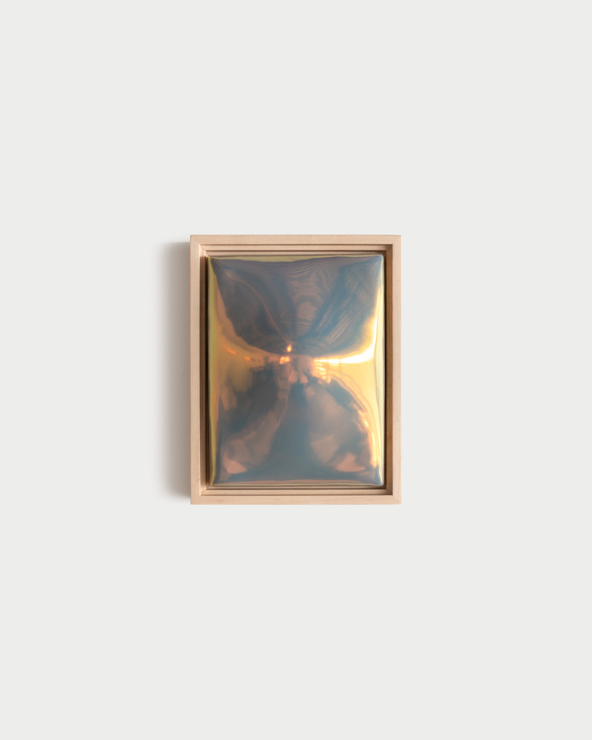 "Convex" 6x8" ceramic wall relief with a convex raised form and iridescent glaze