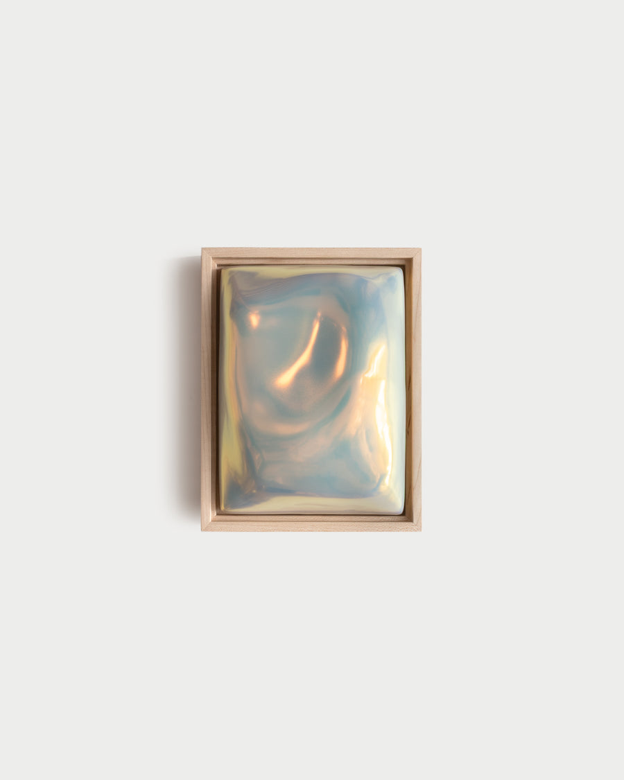 "Fold" 6x8" ceramic wall relief with a folded raised form and iridescent glaze
