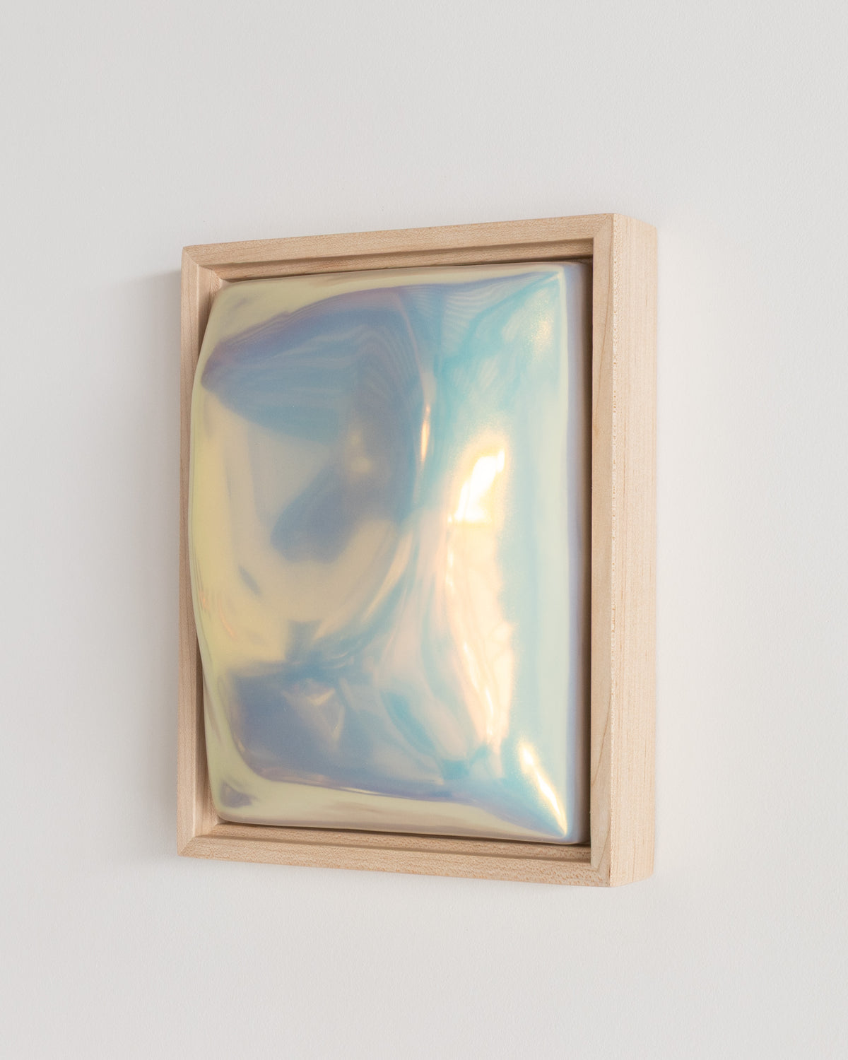 Detail of Fold showing the folded raised form and pale blue iridescent glaze