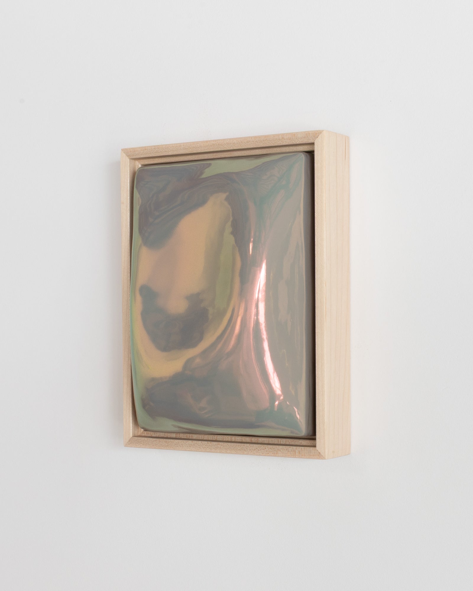 Side view of Fold in a wooden frame with taupe iridescent glaze