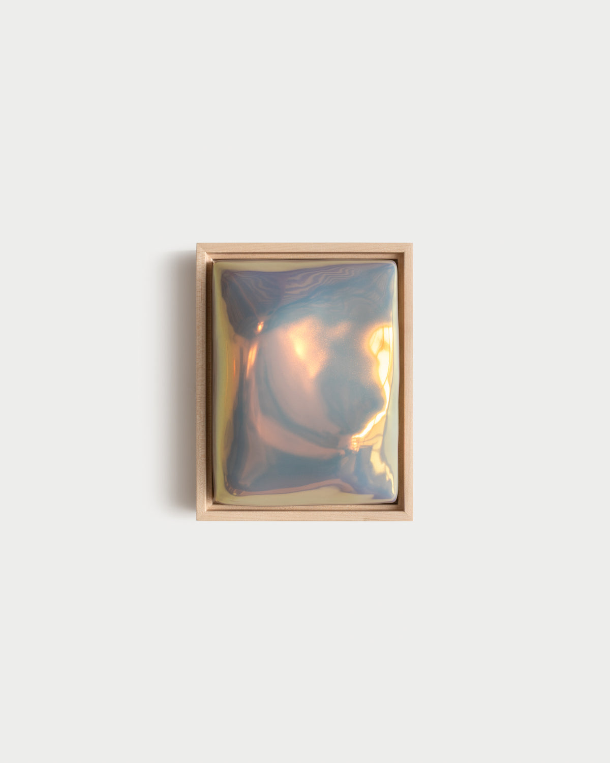 "Sway" 6x8" ceramic wall relief with a flowing raised form and iridescent glaze