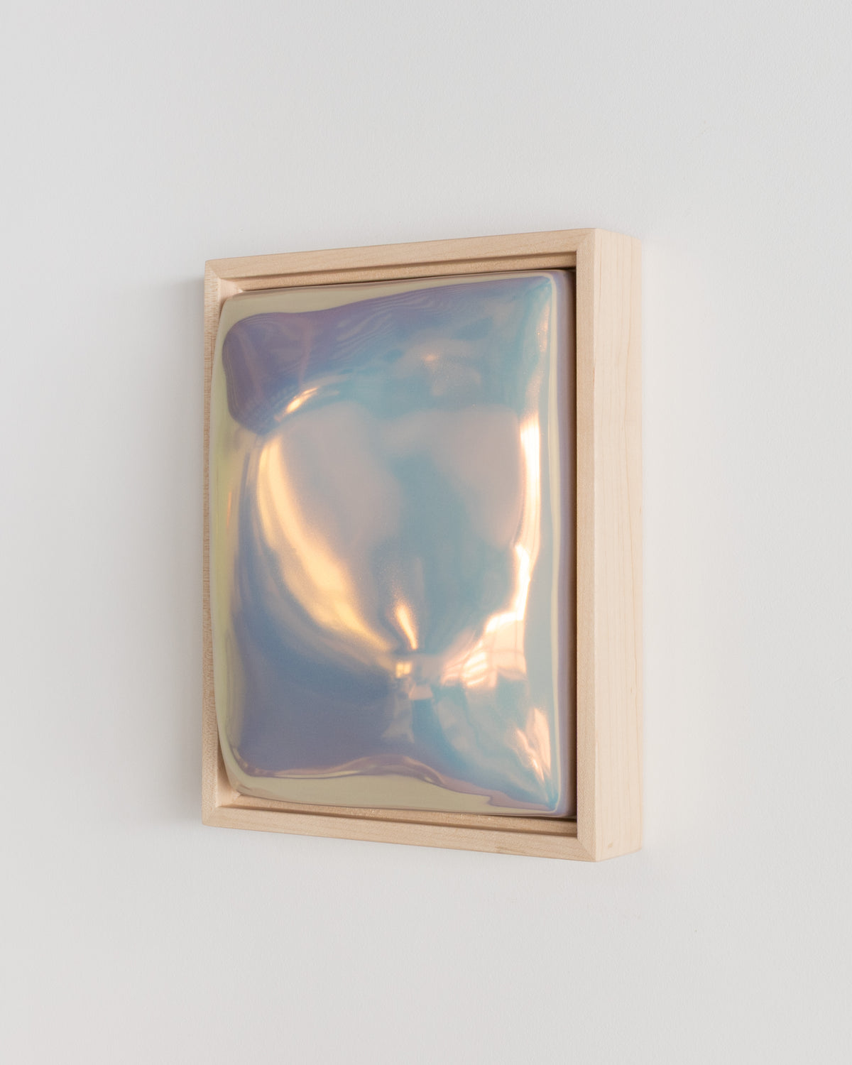 Detail of "Sway" showing the flowing raised form and pale blue iridescent glaze