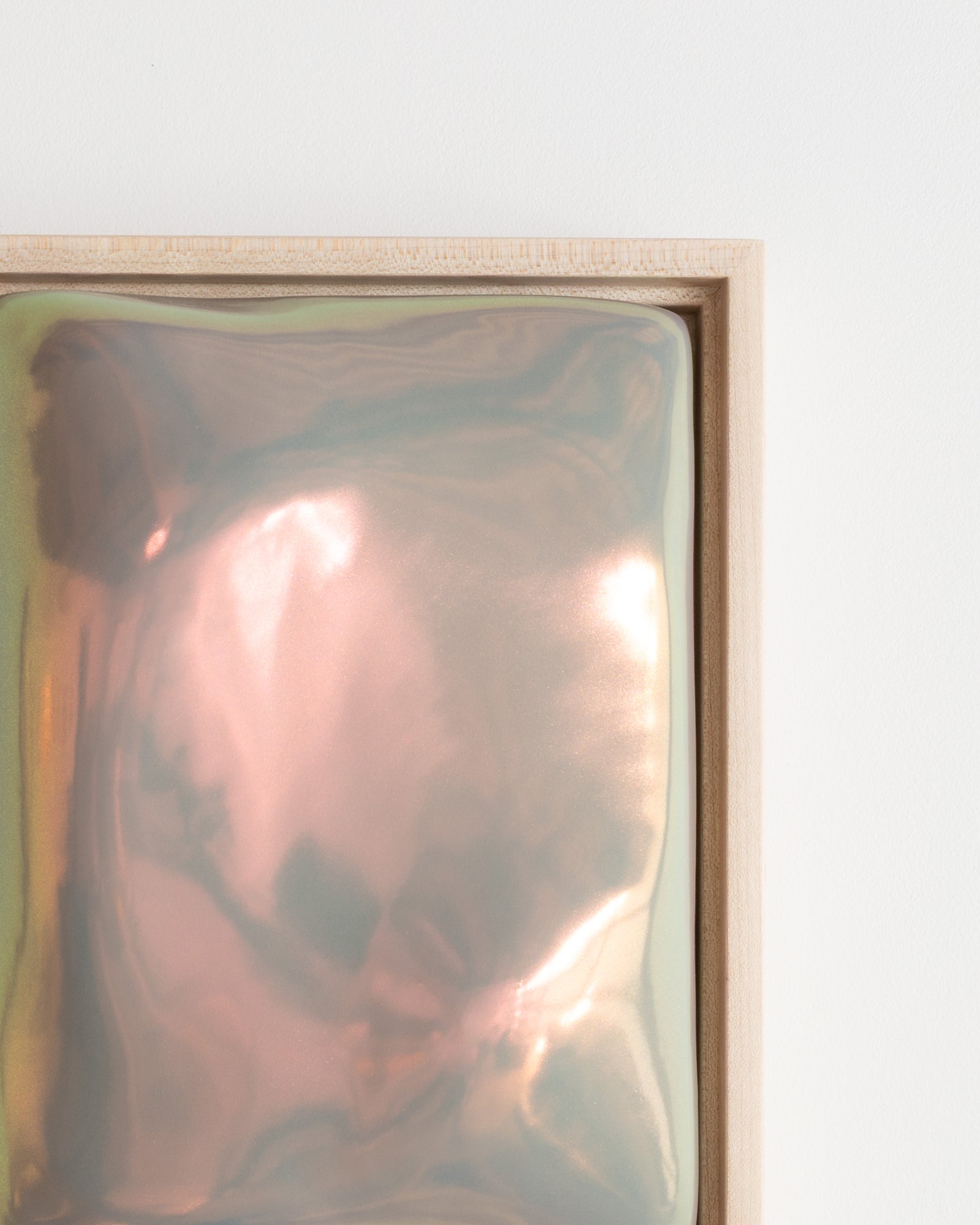 Angled detail of Sway showing the flowing raised form and taupe iridescent glaze