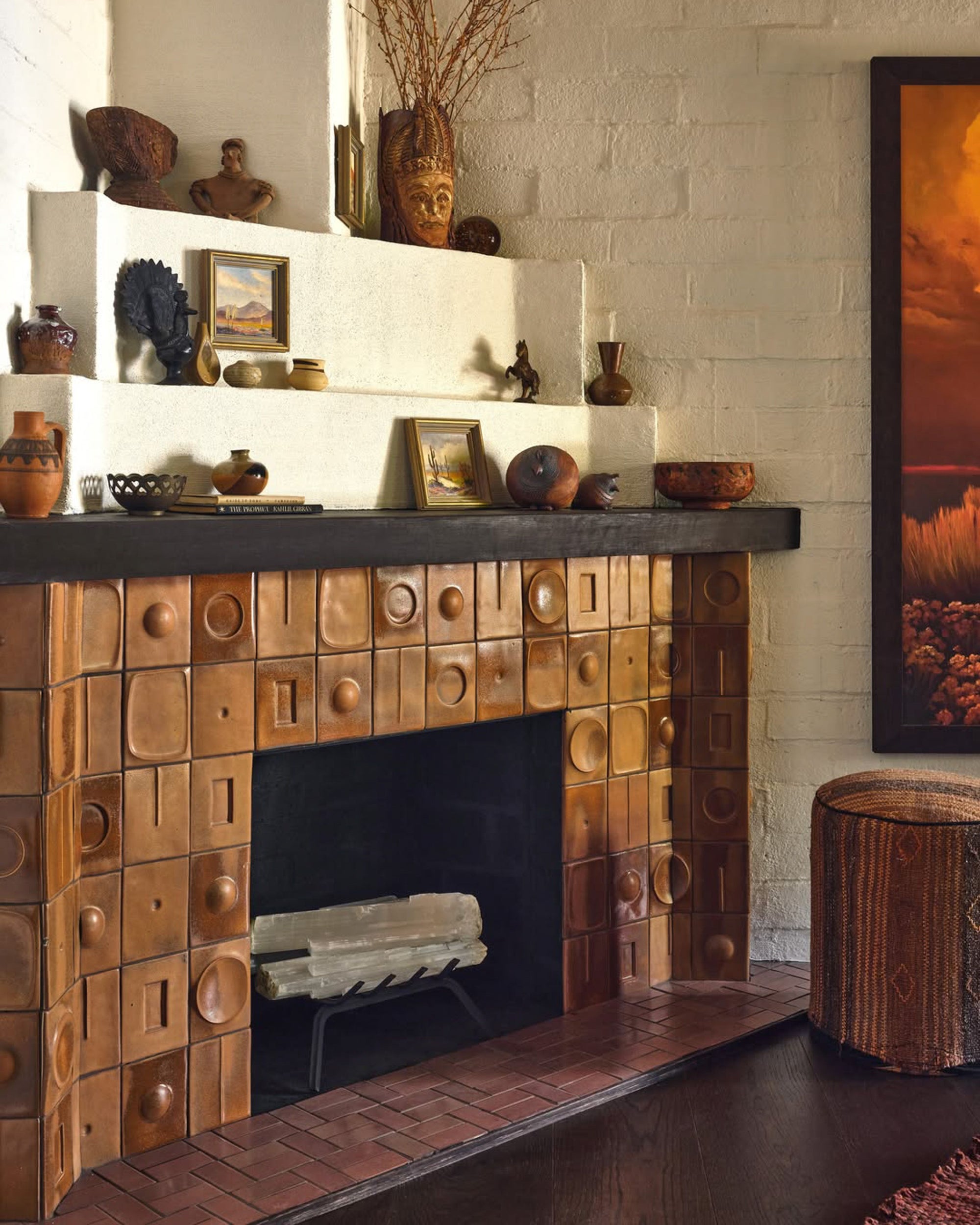 Functional tiles in dining room fireplace. Design by A1000XBetter, photography by Michael Clifford
