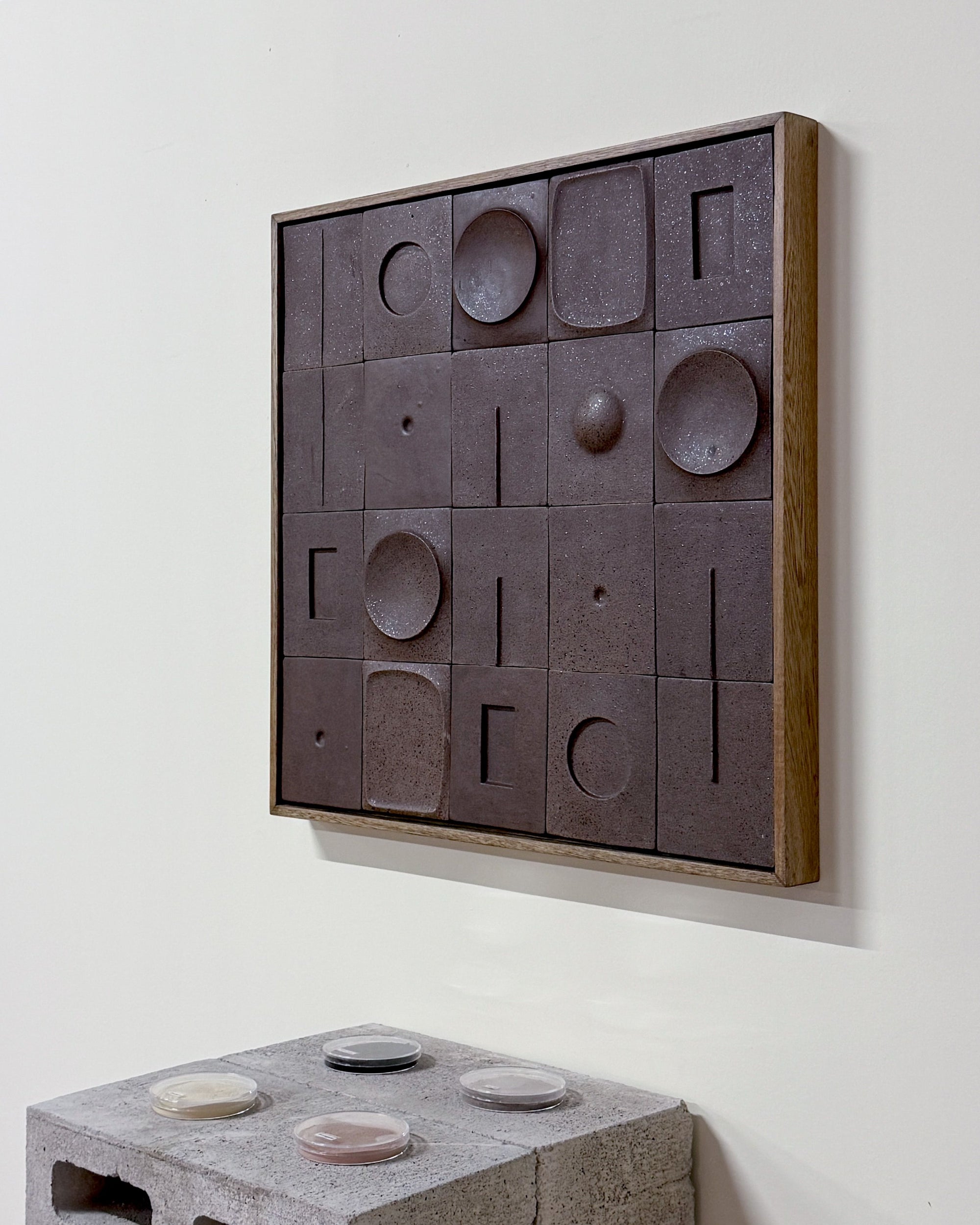 Functional tiles framed on the wall by LOFA Ceramics