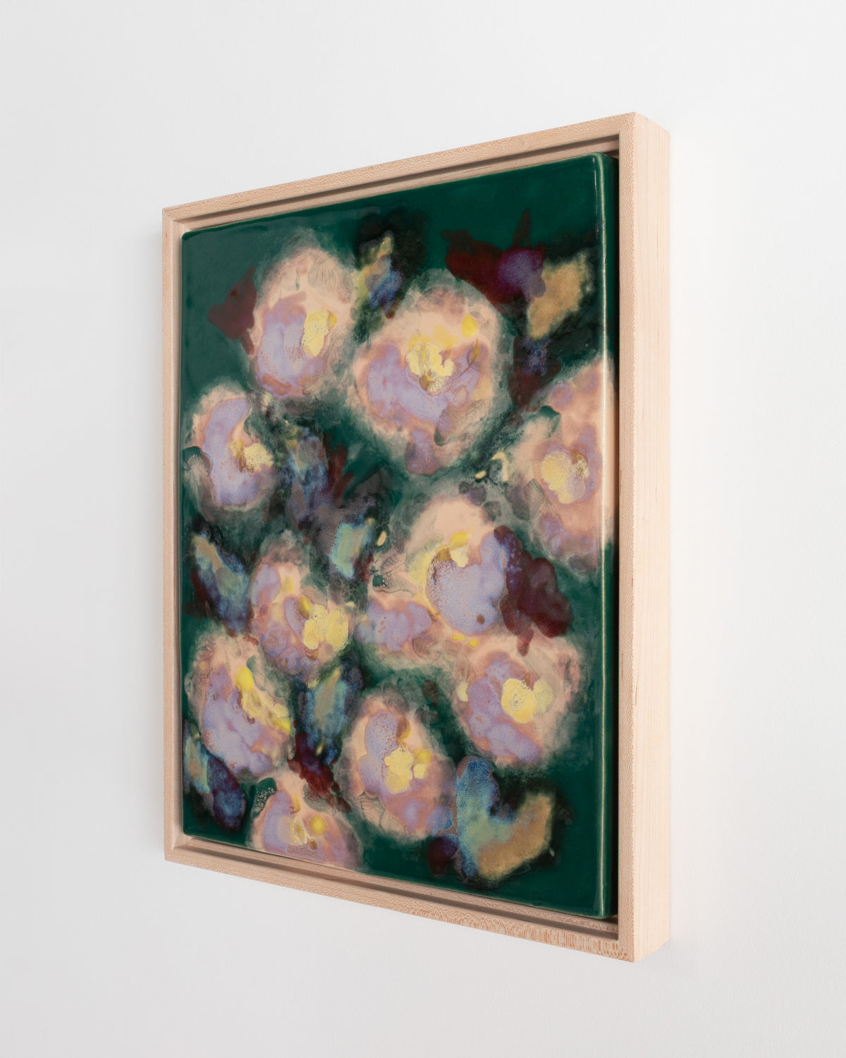 Side detail of "I'll Be in the Garden" showing the framed painting and deep green surface