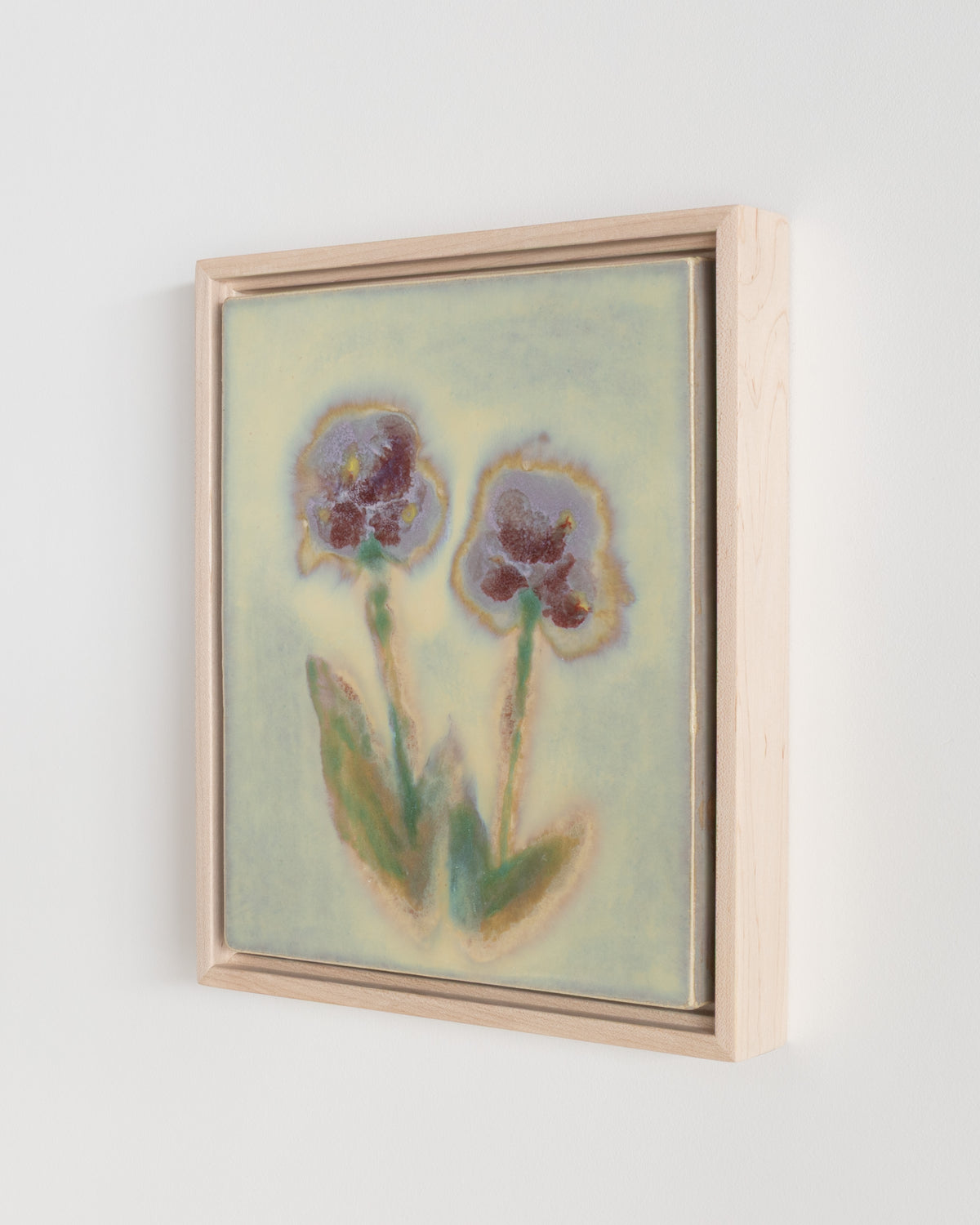 Detail of "Between You and Me" showing two flowers on a pale green background