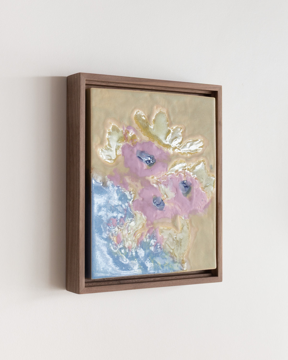 Angled detail of "Breakfast Table" showing glossy glaze over pink and yellow flowers