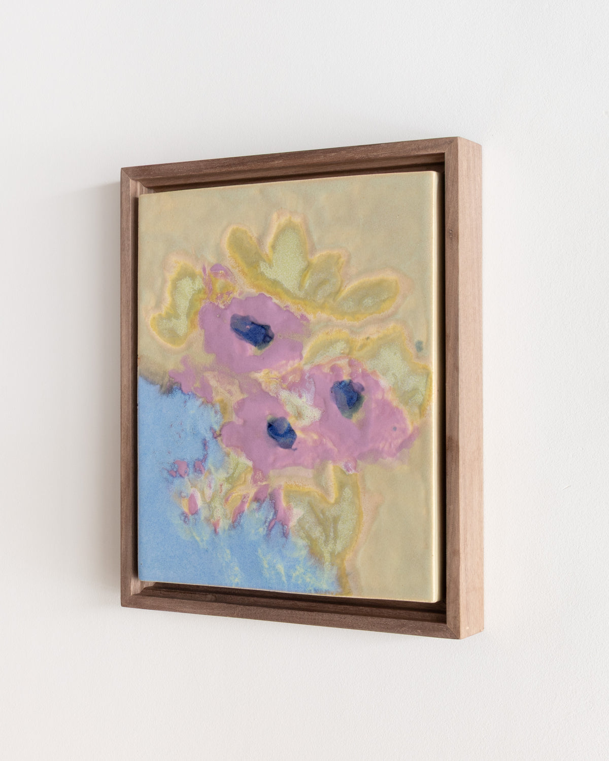 Detail of "Breakfast Table" showing pink flowers with yellow petals on a pale background