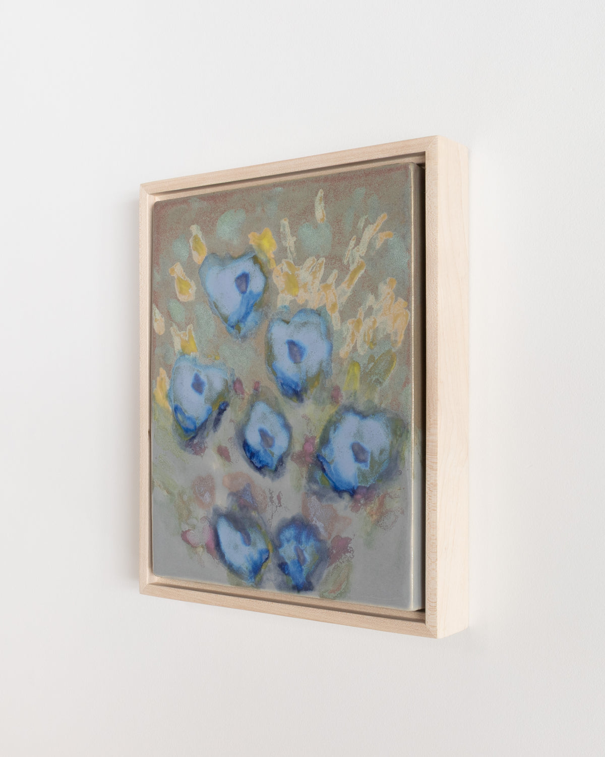 Detail of "Meadow" showing blue flowers and yellow marks in a wood frame