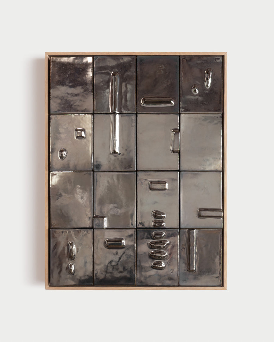 "Continuum" 18x24" ceramic tile mural with gridded raised forms and dark chrome glaze