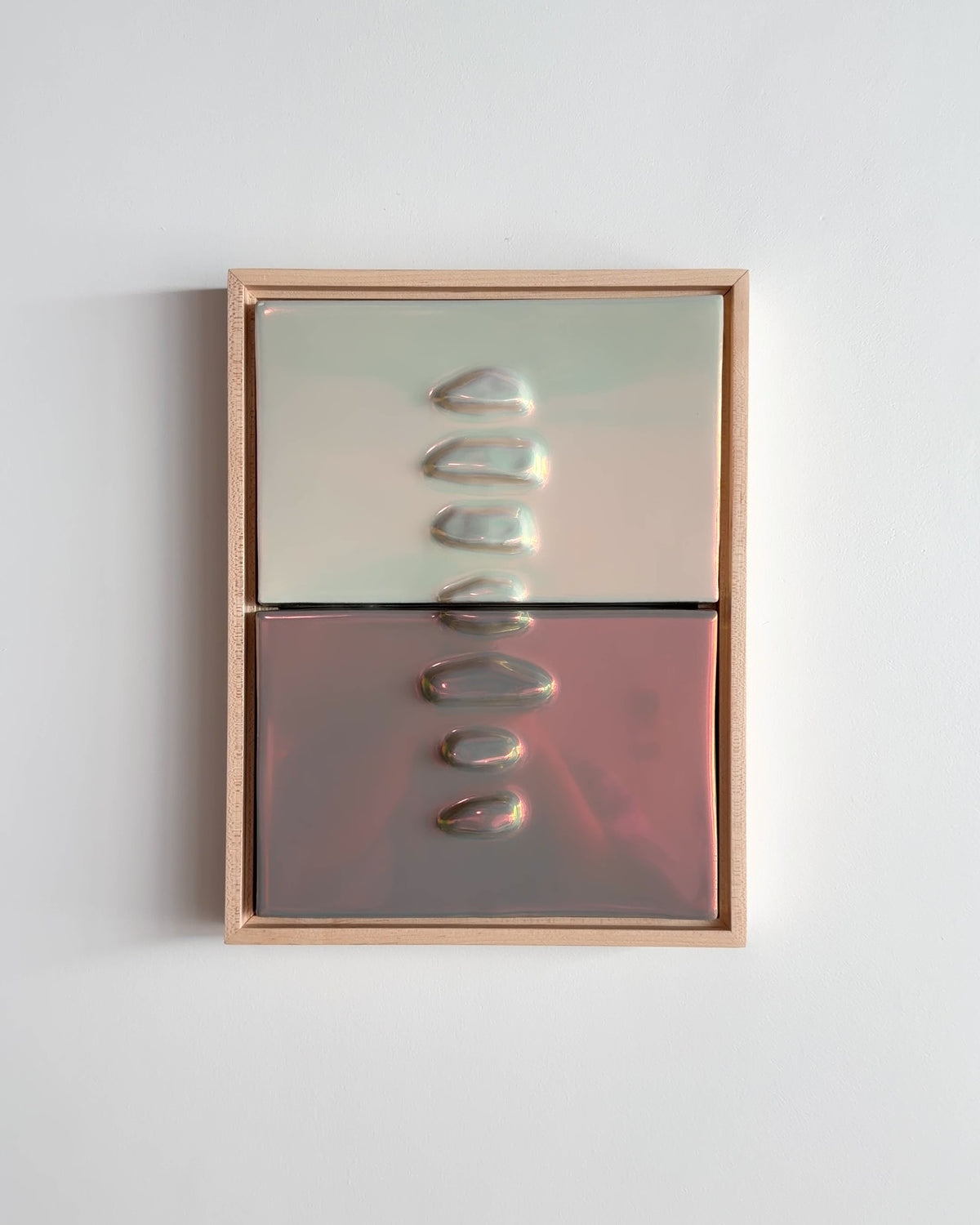 Video of Duo Formations 9x12" ceramic wall relief showing the two-panel raised formation and light taupe iridescent glaze