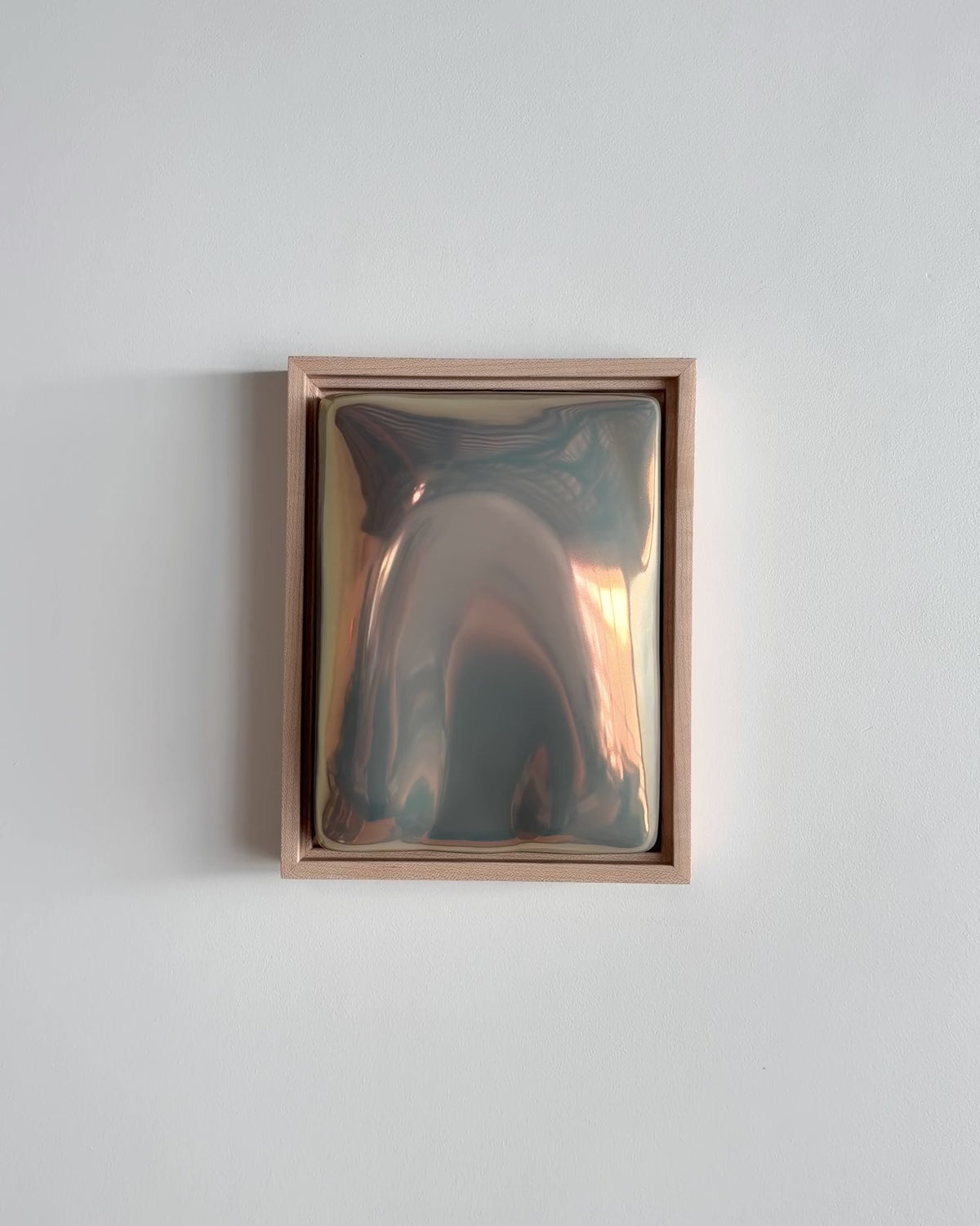 Video of "Arch" 6x8" ceramic wall relief showing a raised arch form and iridescent glaze