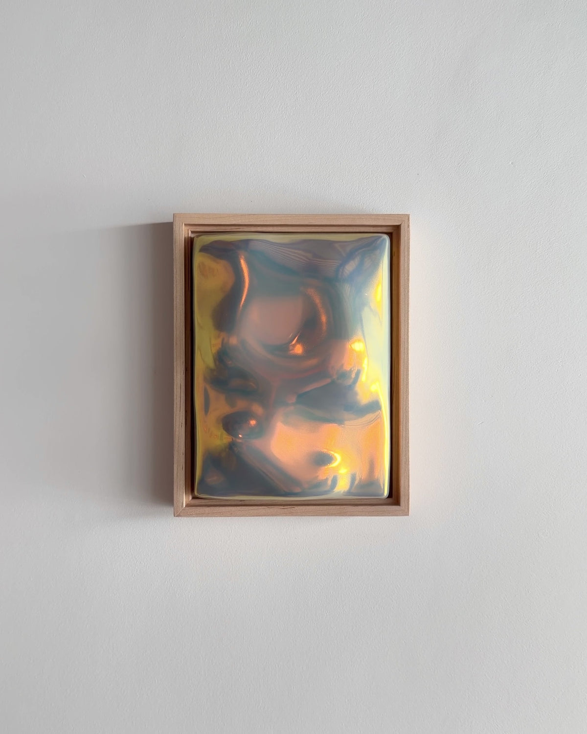 Video of Flora 6x8" ceramic wall relief showing raised organic forms and iridescent glaze